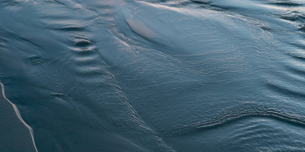 Quiet Retreats | Shiny blue sand