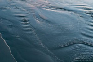 Quiet Retreats | Shiny blue sand